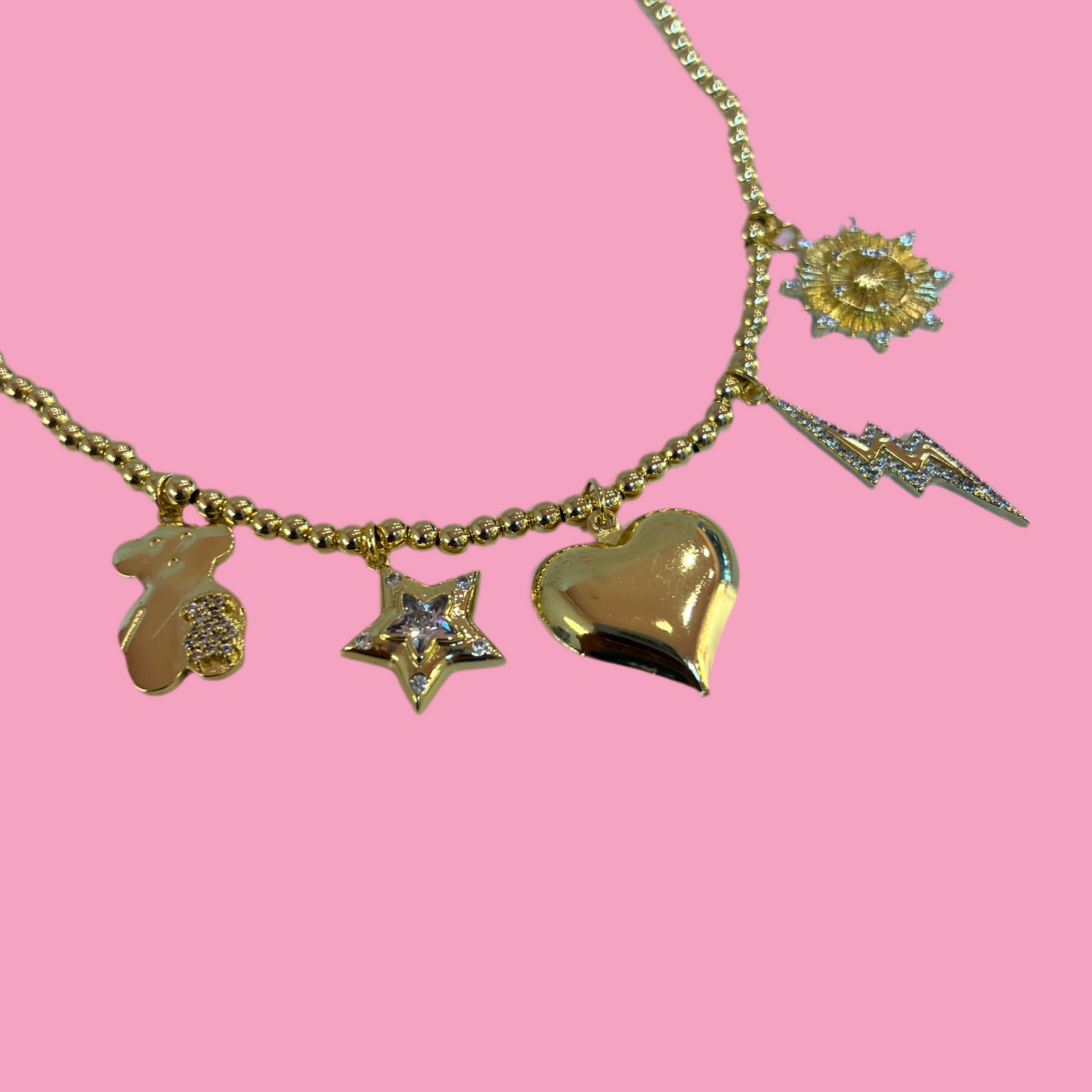 Collar Charms Dorado